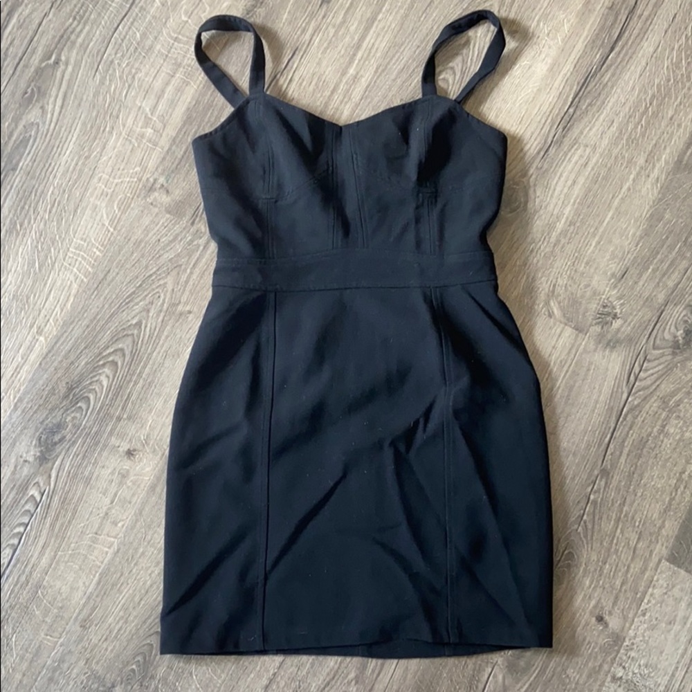 Little black dress, fitted.